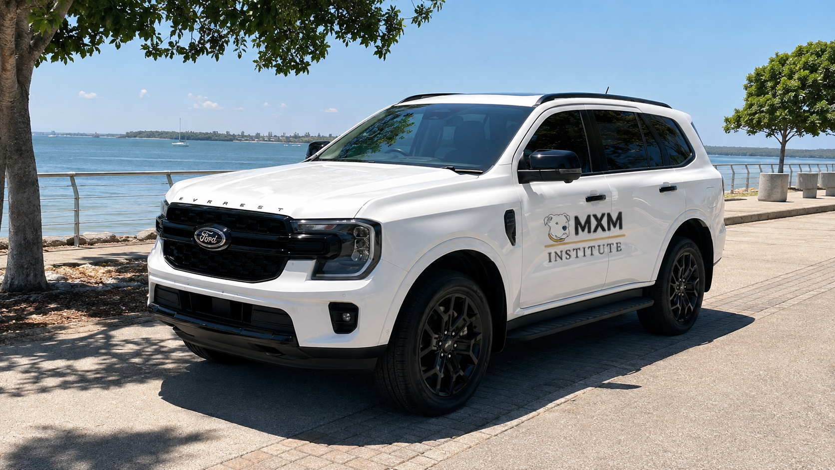 MXM Institute branded vehicle